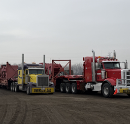 Oversized load convoy truck hauling Mammoet crane components